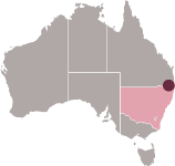 A graphic of the Australian continent with NSW state shaded and small dot representing Ewingsdale.